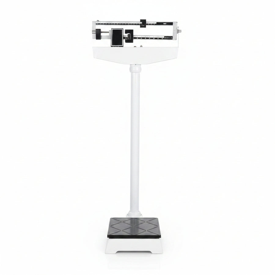 A white and black height and weight scale with a digital display, a mobile phone on the display, and a pair of black weights beside it.