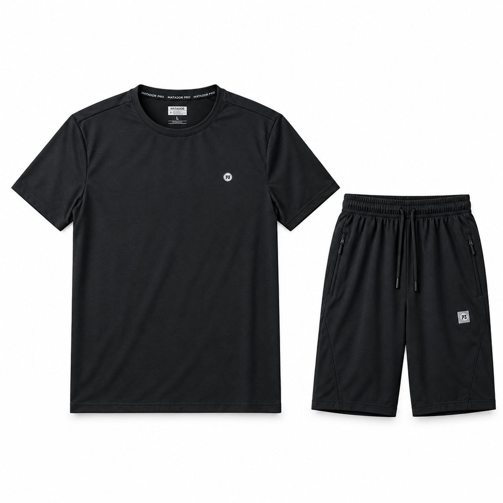 A black short-sleeve performance t-shirt and matching black shorts laid flat on a light gray textured background, with text at the top reading 'MATADOR PRO PERFORMANCE SET' and 'FULL COMPLETE APPAREL SYSTEM'.