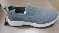 A pair of Soccerex Men's Comfort Shoes displayed on a flat surface, predominantly gray in color with a textured sole and lace-up closure.