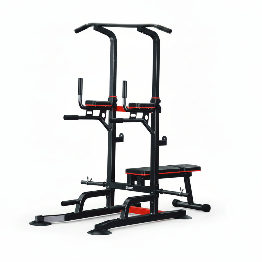 A multi-functional home gym trap bar with a pull-up bar, dual pull-up handles, a weight bench, and a barbell rack, in black with red accents, photographed against a light gray background.