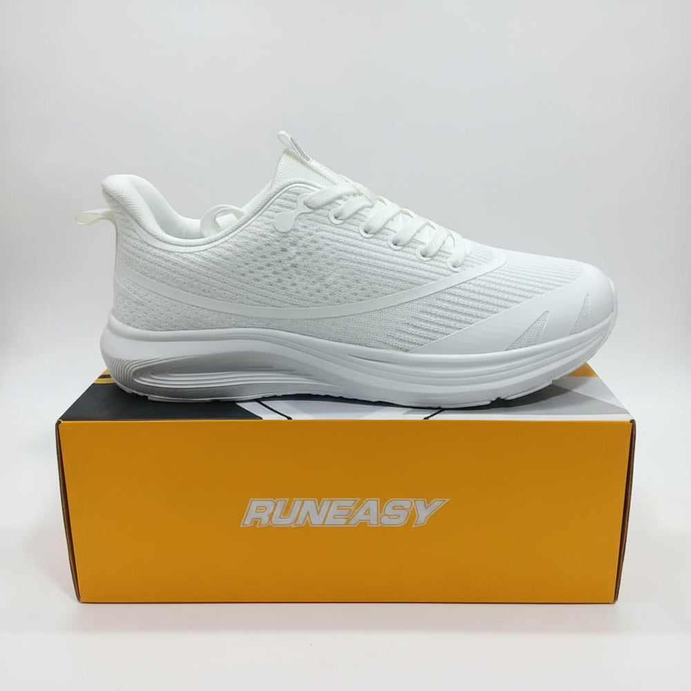 A white RunEasy athletic sneaker shown from the side, resting on top of its orange and black branded shoebox.