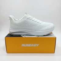 A white RunEasy athletic sneaker shown from the side, resting on top of its orange and black branded shoebox.