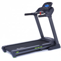 Treadmill with a digital display on a white background